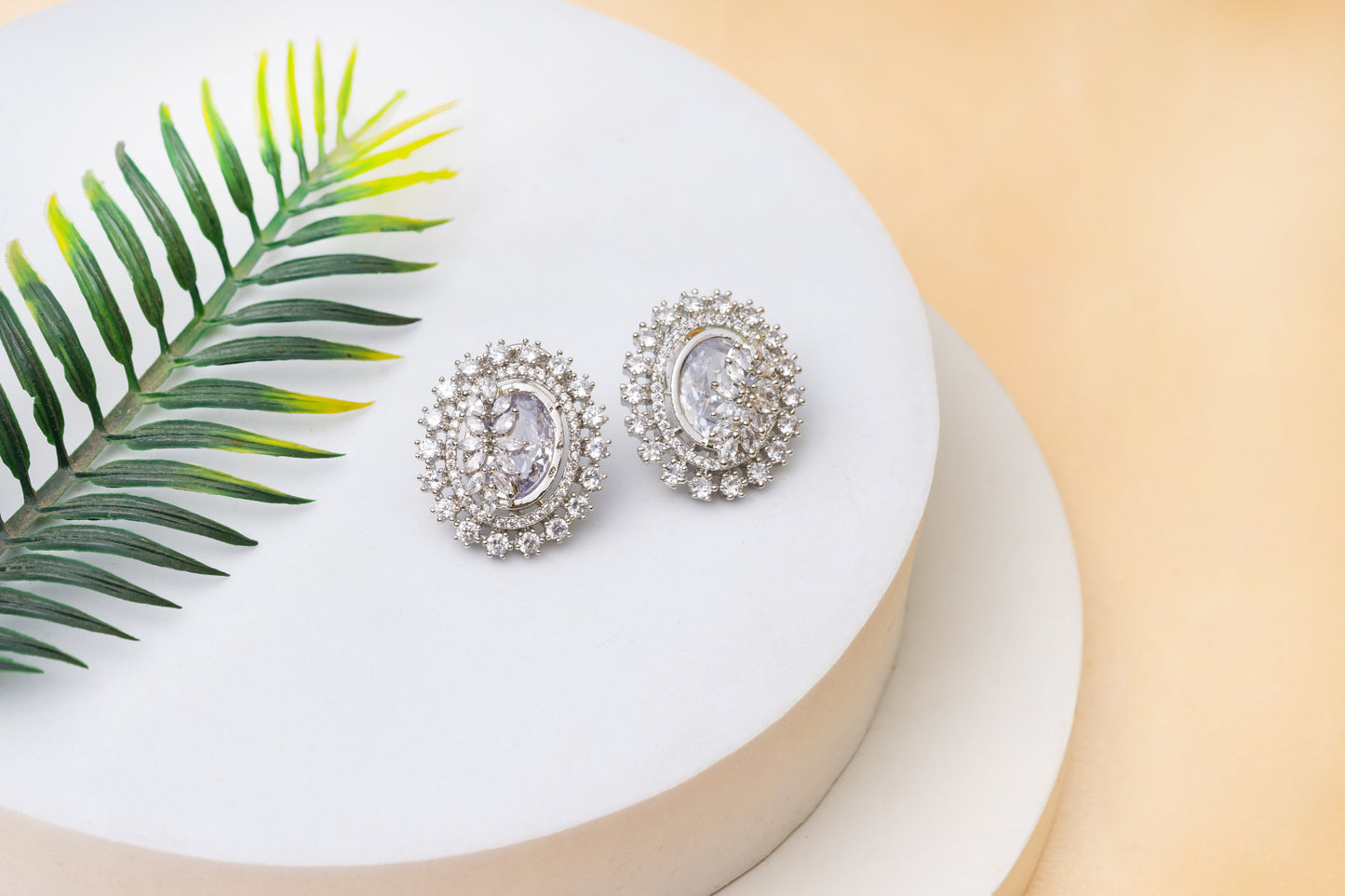 American Diamond Oval Shape Stud Earrings In Rhodium Polish