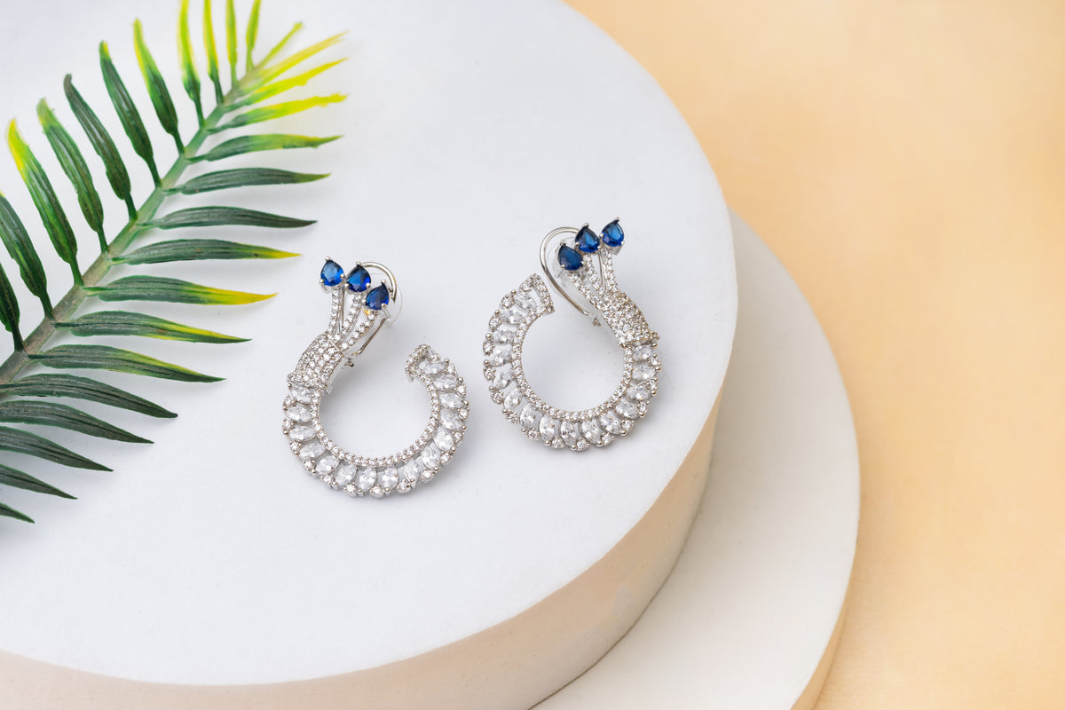 Silver Toned Studded Statement American Diamond Stud Earrings- Sapphire