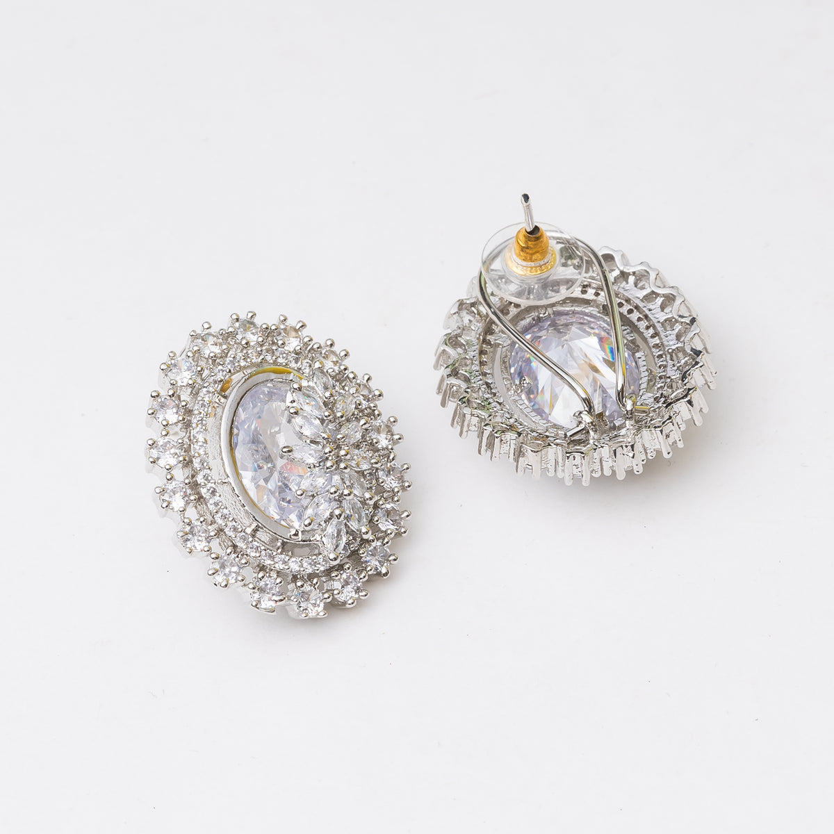 American Diamond Oval Shape Stud Earrings In Rhodium Polish