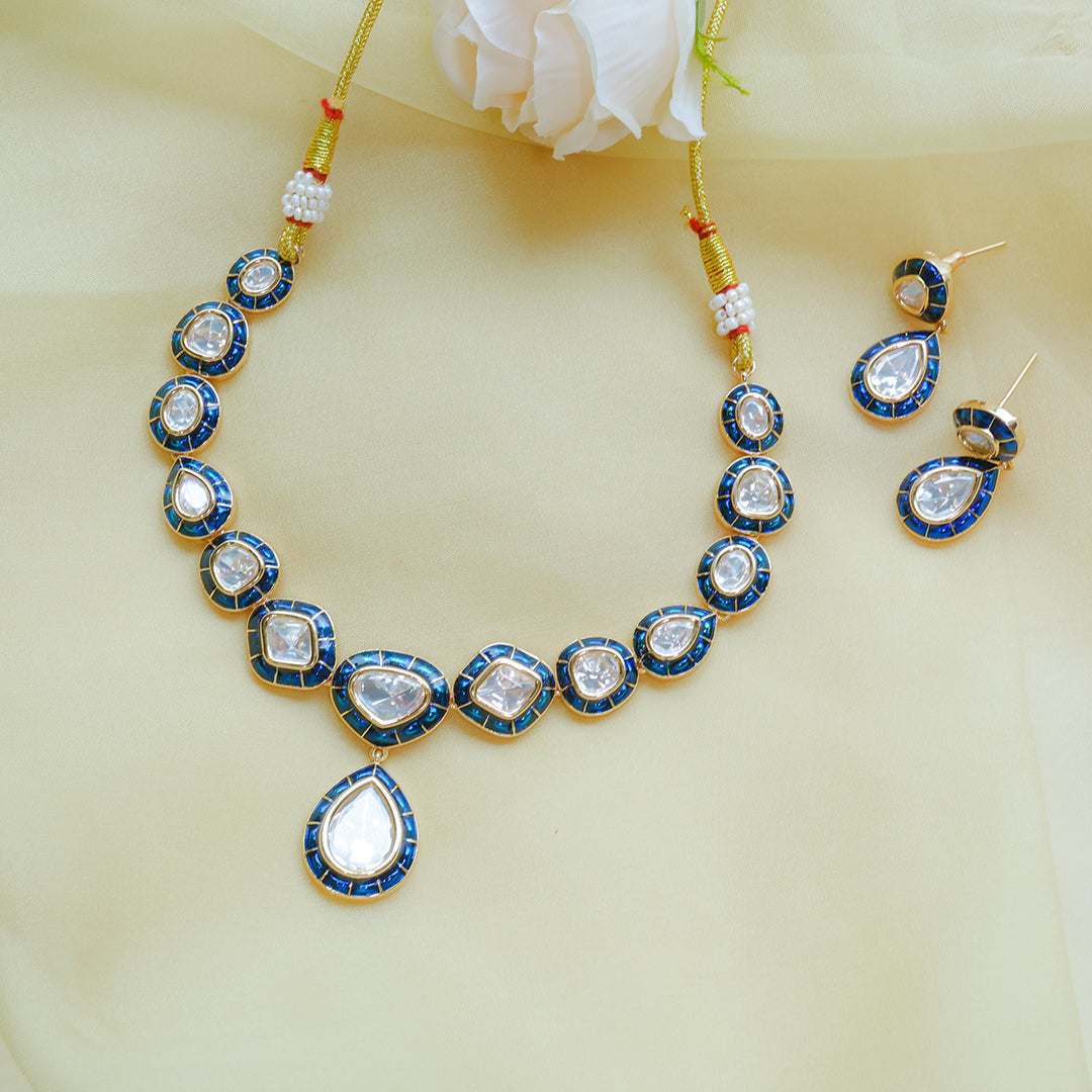 Jewelry set with necklace and earrings on a light yellow background