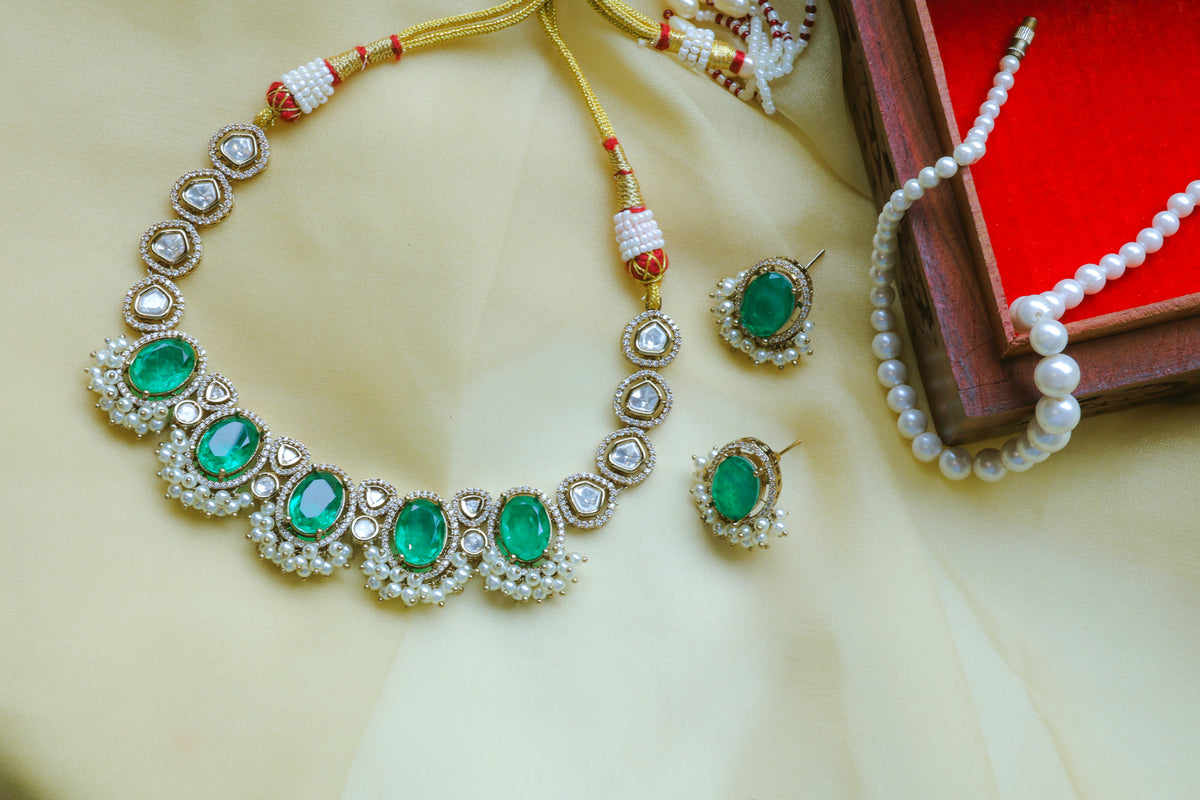 Jewelry set with necklace and earrings on a light background