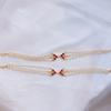 Traditional Gold-Plated Multi-Strand Pearl Anklets with Emerald Green and Ruby Red Stone Accents
