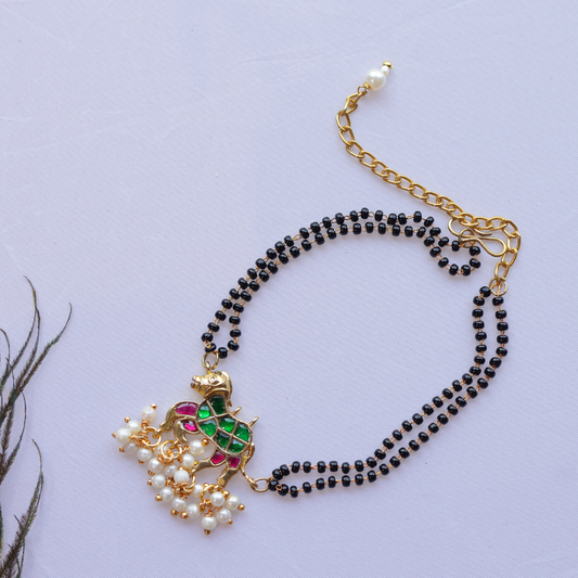 Handcrafted Double Layer Black Bead Hand Mangalsutra In Paachi Kundan Horse Charm