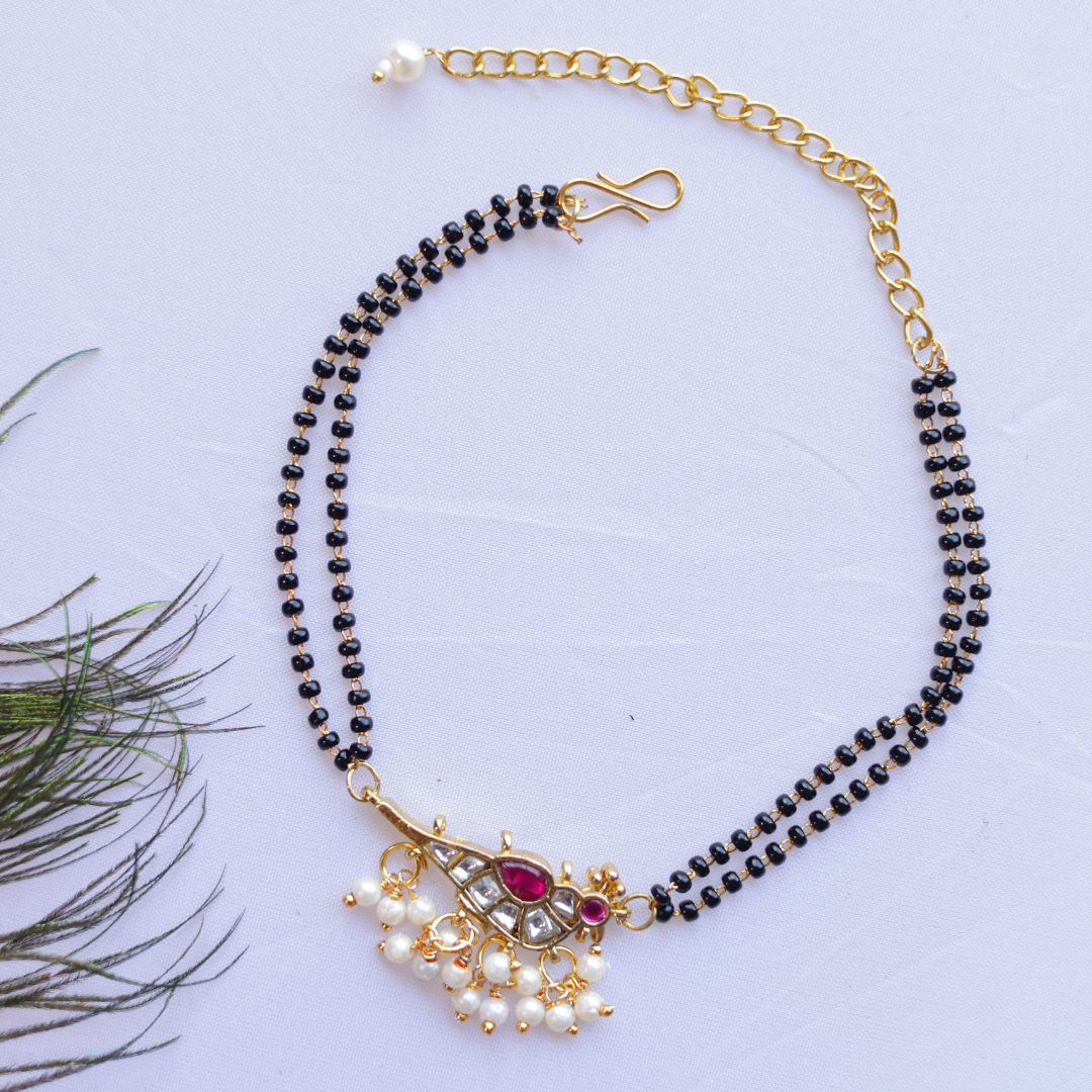 Handcrafted Double Layer Black Bead Hand Mangalsutra In Paachi Kundan Bird Charm