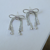 The Diamanté Bow Tassel Earrings