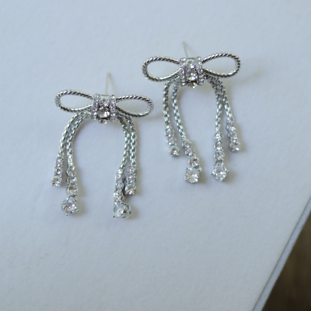The Diamanté Bow Tassel Earrings