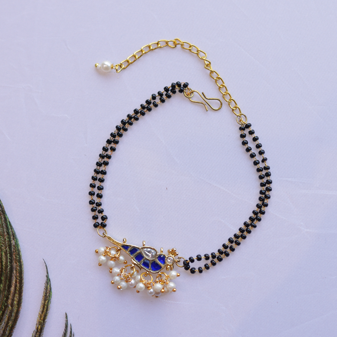 Handcrafted Double Layer Black Bead Hand Mangalsutra In Paachi Kundan Bird Charm
