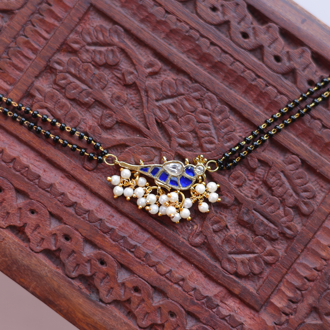 Handcrafted Double Layer Black Bead Hand Mangalsutra In Paachi Kundan Bird Charm