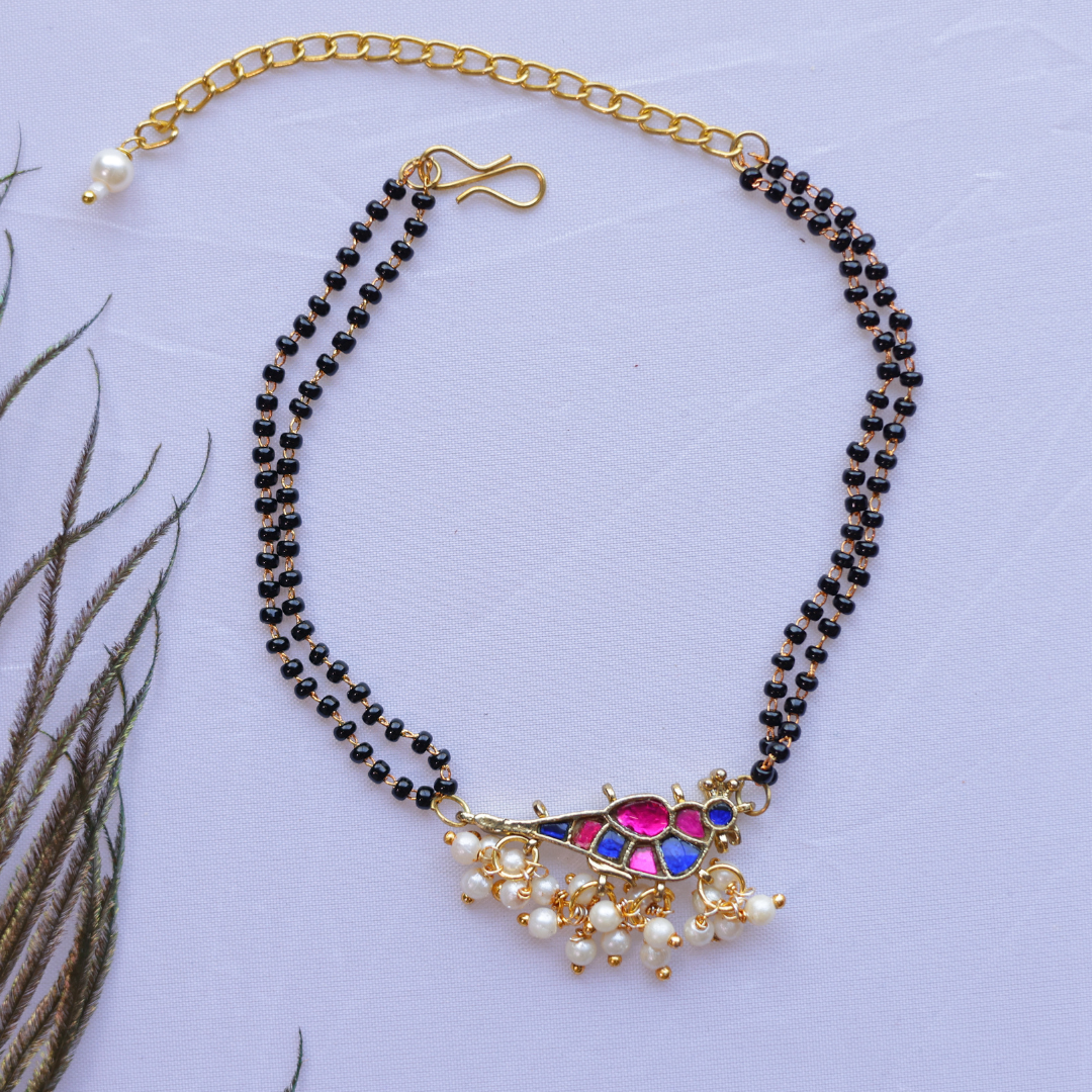 Handcrafted Double Layer Black Bead Hand Mangalsutra In Paachi Kundan Bird Charm