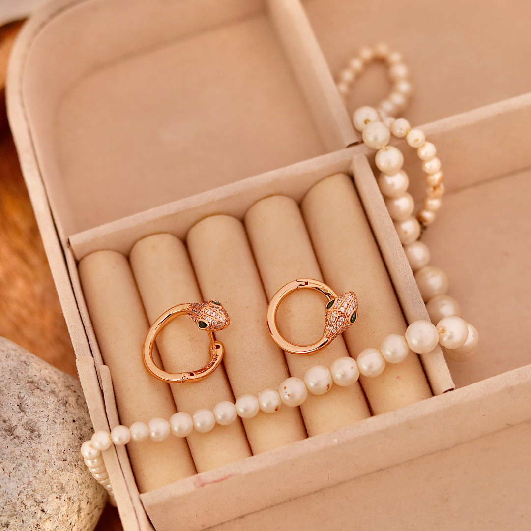 Rose Gold Snake Huggie Hoops with Green Crystal Eyes