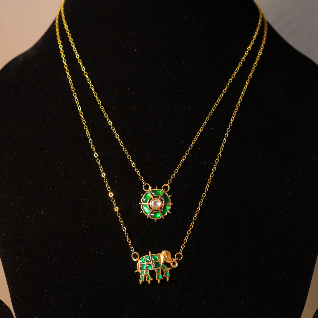 Handcrafted Gold-Plated Layered Necklace Set with Emerald Paachi Kundan Green Stone Floral & Elephant Charms