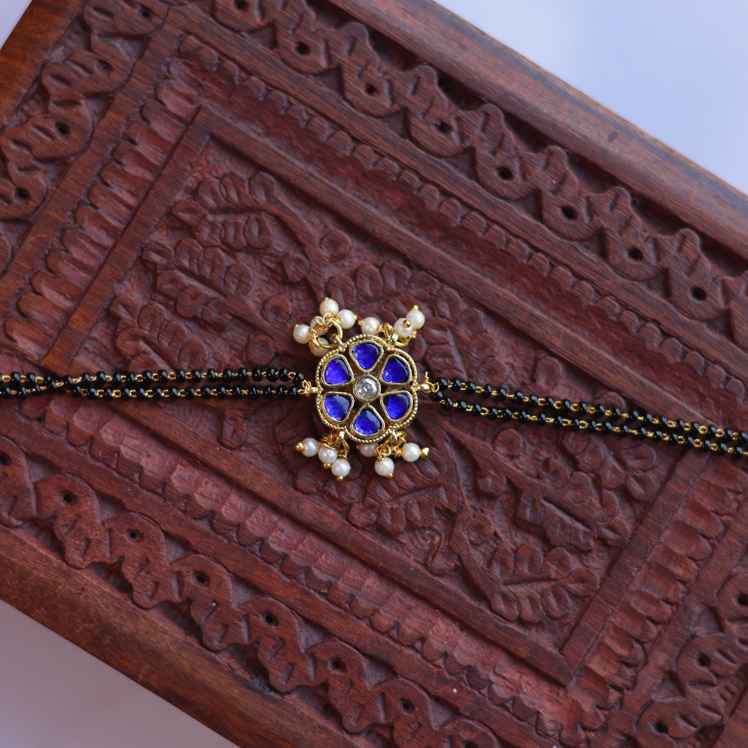Traditional Gold-Plated Blue Kundan Hand Mangalsutra with Dual-Strand Black Beads and Pearl Droplets