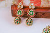 Decorative earrings with green, red, and gold colors on a white background