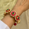 Gold Plated Ruby Paachi Kundan Pochi